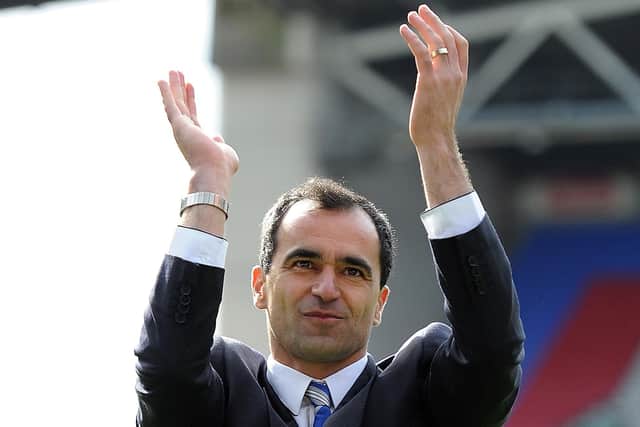 Roberto Martinez applauds the Wigan Athletic fans at the DW