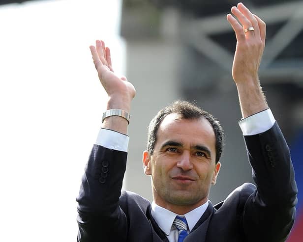 Roberto Martinez applauds the Wigan Athletic fans at the DW