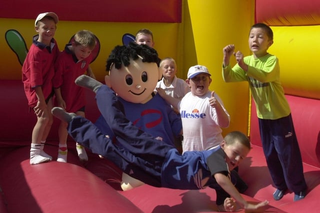 Fun on a bouncy castle in 2001