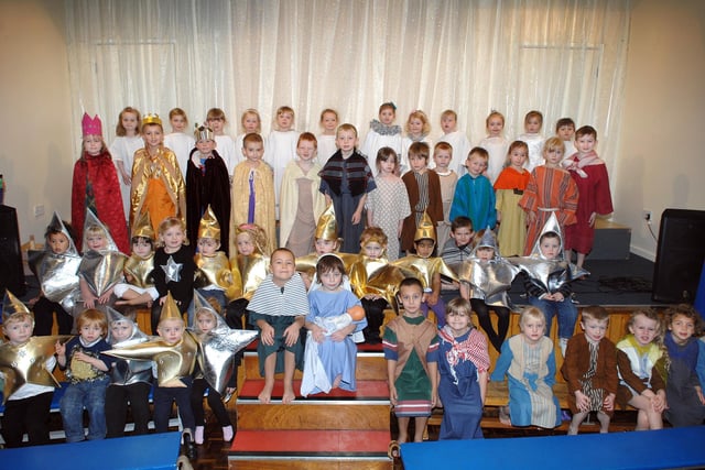 Reception, Year One and Year Two pupils at All Saints CE Primary School, Appley Bridge, and Little Acorns Nursery children in costume for their nativity Starlight.