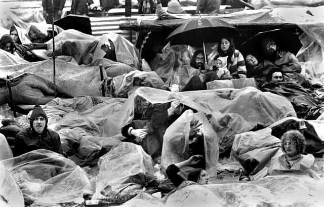 The miserable conditions suffered by music fans in the pouring rain at the Bickershaw Festival in 1972. 