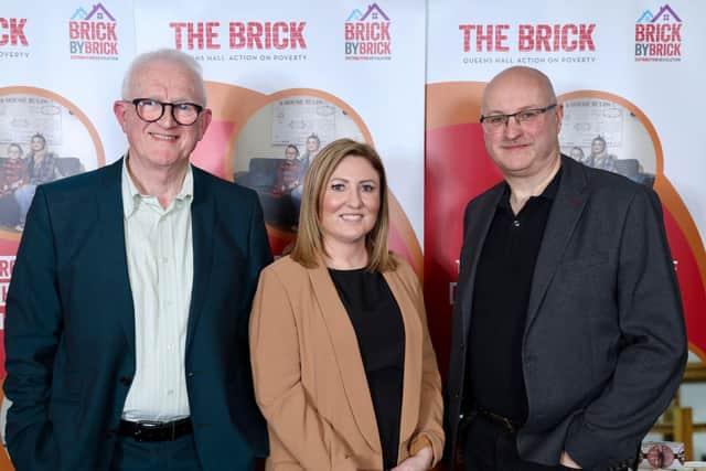 The Brick's CEO Keely Dalfen, centre, with outgoing chairman of trustees Dr John Parker , left, and the new chairman Dr Paul Plant