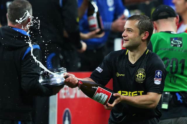 Shaun Maloney celebrates winning the FA Cup in 2013