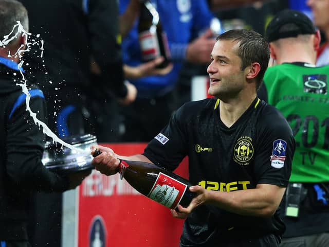 Shaun Maloney celebrates winning the FA Cup in 2013