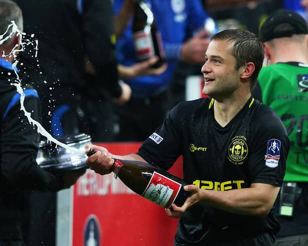 Shaun Maloney celebrates winning the FA Cup in 2013