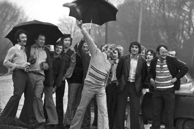 A wellie throwing competition near the Navigation pub in Gathurst in 1975.