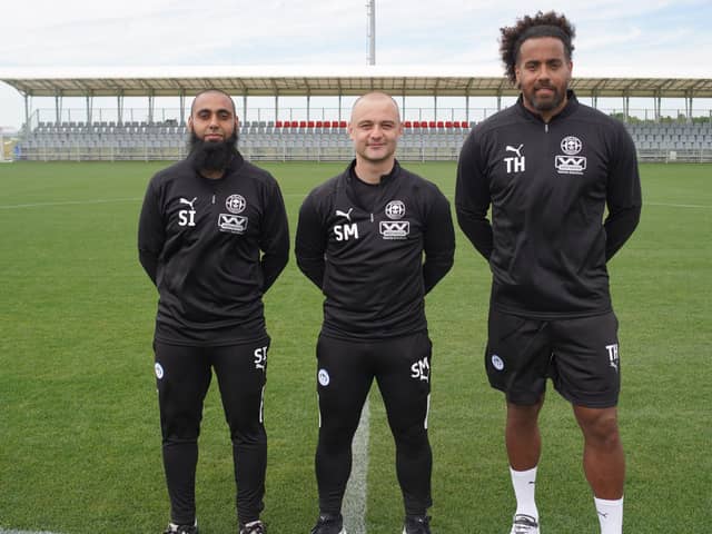 Shaun Maloney parades the new additions to his Latics coaching staff