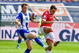 Jensen Weir gets the better of his Wrexham opponent