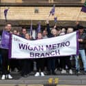 Unison members on the picket line outside Coops Building in Wigan as We Are With You staff take strike action