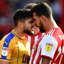 Sam Morsy gets his point across during his time with Latics