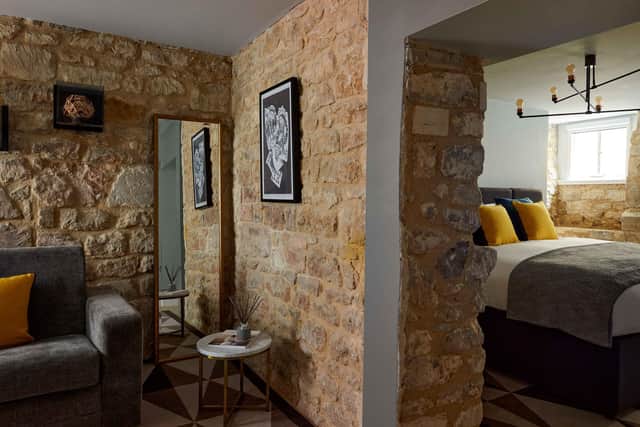 The Vault rooms blend traditional features and calming ambiance with soft lighting, exposed brickwork and vaulted stone ceilings.