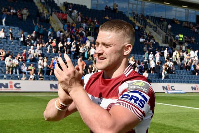 Hampshire applauds the Wigan fans at full time