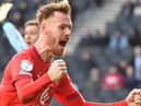 Tom Naylor celebrates his goal