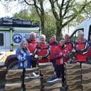 Grubs Footwear handover boots and footwear to Bolton Mountain Rescue Team