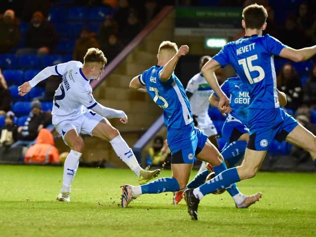 Will Goodwin shoots for goal for Latics