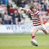 Wigan Warriors have named their 21-man squad to face Salford Red Devils