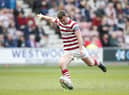 Wigan Warriors have named their 21-man squad to face Salford Red Devils