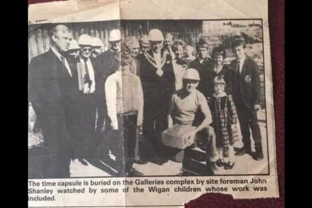 A newspaper cutting of the time capsule memory box that was buried under Wigan Galleries