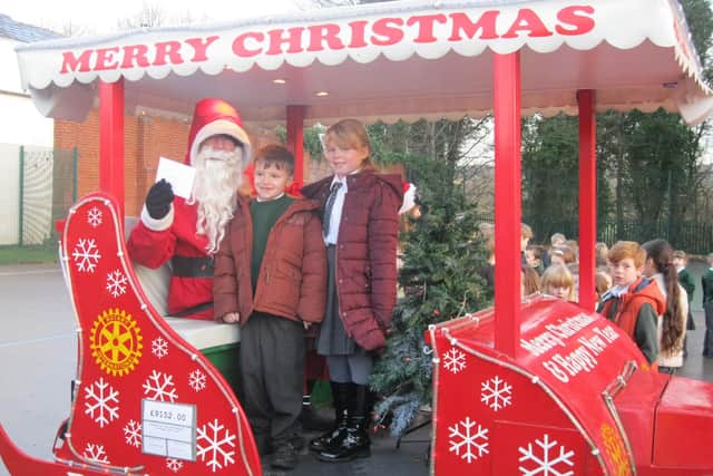 Wigan Rotary's Santa on one of his pre-pandemic Christmas tours