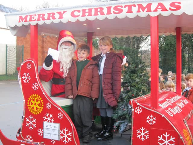 Wigan Rotary's Santa on one of his pre-pandemic Christmas tours