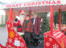 Wigan Rotary's Santa on one of his pre-pandemic Christmas tours
