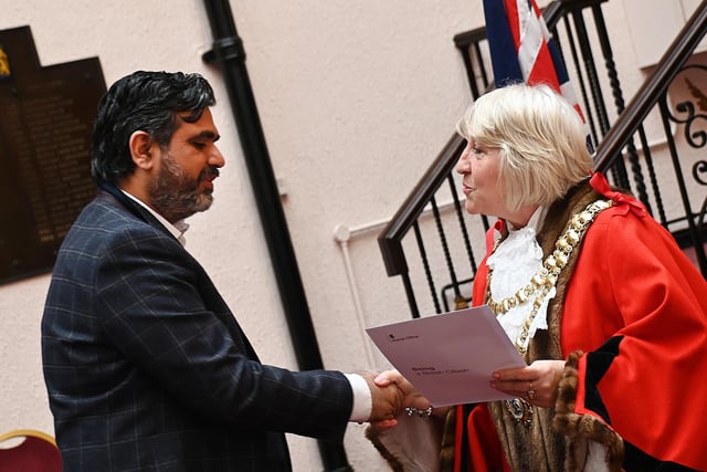 The Mayor of Wigan Coun Marie Morgan  welcomes new citizens to the borough and presents certificates at the monthly British Citizenship ceremony, held at Wigan Town Hall.