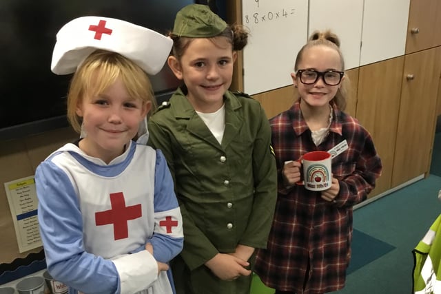 Children dress up for different job roles.