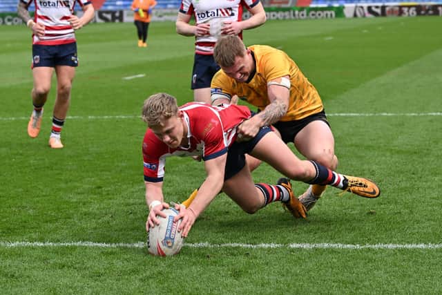 Former Warriors academy youngster Cian Tyrer has signed a new deal at Oldham