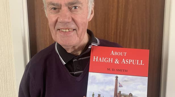 Author David Smith with his book About Aspull and Haigh
