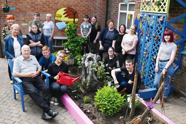 Staff, students and residents enjoying the outdoor space.