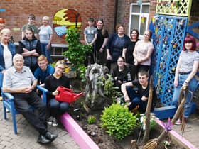 Staff, students and residents enjoying the outdoor space.
