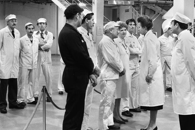 Princess Anne chats to workers at the Heinz Kitt Green factory on Friday 1st of December 1989.