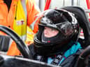A youngster is fitted for her ride in a kart at Three Sisters circuit for the Speed of Sight fun day