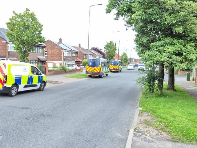 Multiple police vehicles were seen on Kitt Green Road