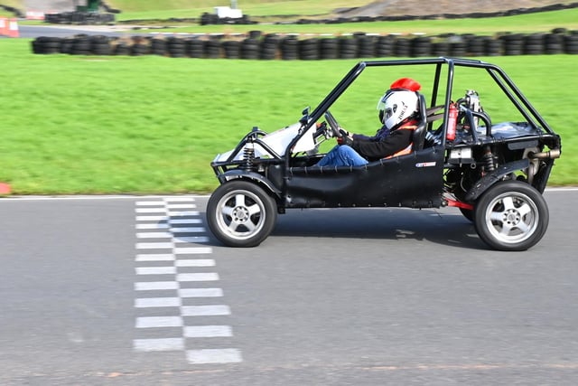 On the track in a custom built, dual controlled car.