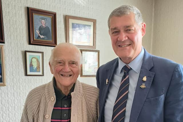 D-Day veteran James Belcher with Charlie Neve, director of the Armed Forces Community HQ in Wigan