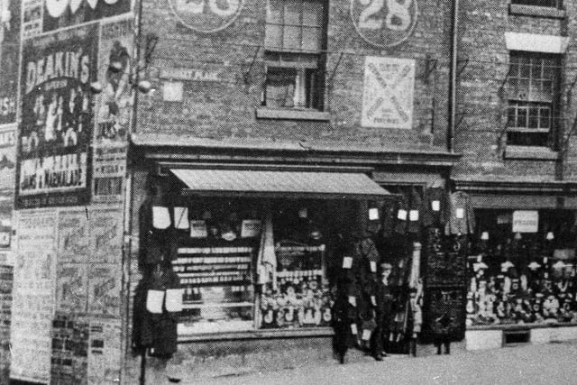 Wilson and Harwood clothiers, jewellers, pawnbrokers and general salesmen of 28 Market Place, Wigan, in the early 1900s.