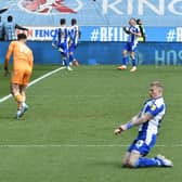 James McClean celebrates his early goal for Latics