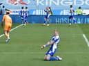 James McClean celebrates his early goal for Latics