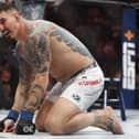 Tom Aspinall realises he's just become champion of the world