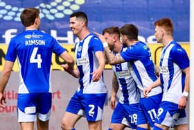 Jon Mellish takes the plaudits after putting Latics ahead inside four minutes