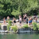People at the East Quarry, Appley Bridge, treating it like a beach in the summer of 2020