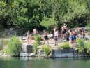 People at the East Quarry, Appley Bridge, treating it like a beach in the summer of 2020