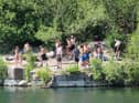People at the East Quarry, Appley Bridge, treating it like a beach in the summer of 2020