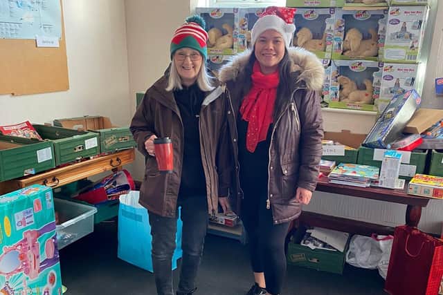 Volunteers with the hampers given last year.