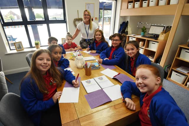 Headteacher Helen Smart with Year Five pupils enjoy their classroom makeover, as designers have created a therapeutic classroom at Worsley Mesnes Comminity Primary School,Wigan.
