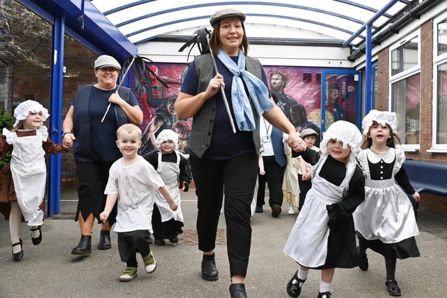 Staff and pupils at St John’s Primary school, Pemberton, celebrate in style as they dressed up in clothes to represent different decades to commemorate the 140th anniversary of their school.