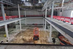 Stack is beginning to take shape. Around 20 food stalls plus bars will be around the edge of the space with a stage on the ground floor at the far end as we look at it. A glass ballustrade will be installed so those enjoying food and drink upstairs can watch the entertainment below. Removing that huge amount of first floor from the old Debenhams was a painstaking process
