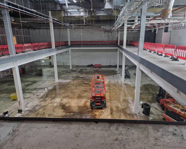Stack is beginning to take shape. Around 20 food stalls plus bars will be around the edge of the space with a stage on the ground floor at the far end as we look at it. A glass ballustrade will be installed so those enjoying food and drink upstairs can watch the entertainment below. Removing that huge amount of first floor from the old Debenhams was a painstaking process