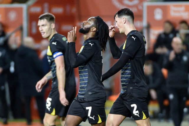 Dion Rankine celebrates scoring his first goal for Latics at Blackpool
